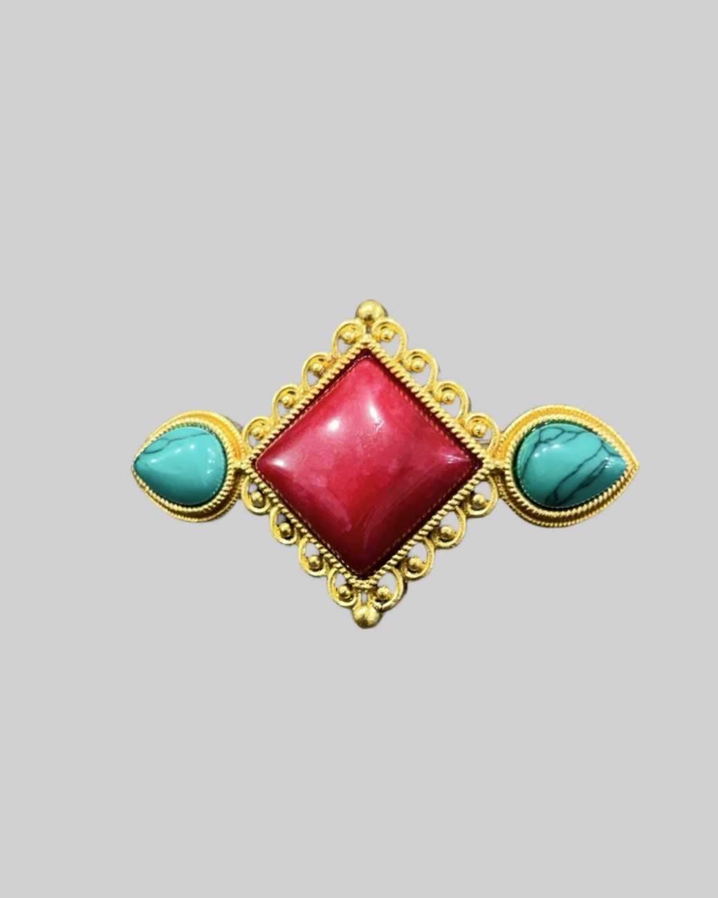 Gold-Plated Tibetan Brooch with Red & Turquoise Stones Ethnic Himalayan Jewelry front Gold-Plated Tibetan Brooch with Red & Turquoise Stones | Ethnic Himalayan Jewelry - Image 1