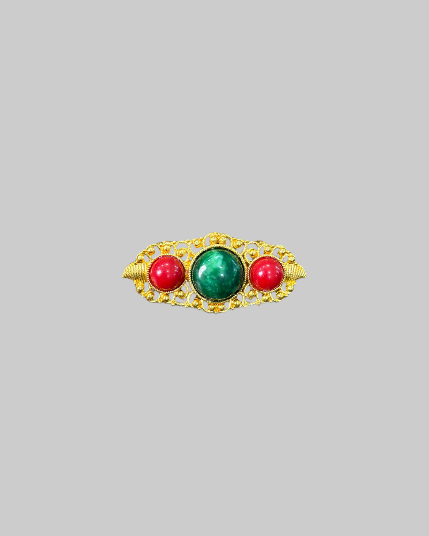 Vintage-Style Gold-Tone Filigree Brooch with Green and Red Cabochons front Vintage-Style Gold-Tone Filigree Brooch with Green and Red Cabochons - Image 1