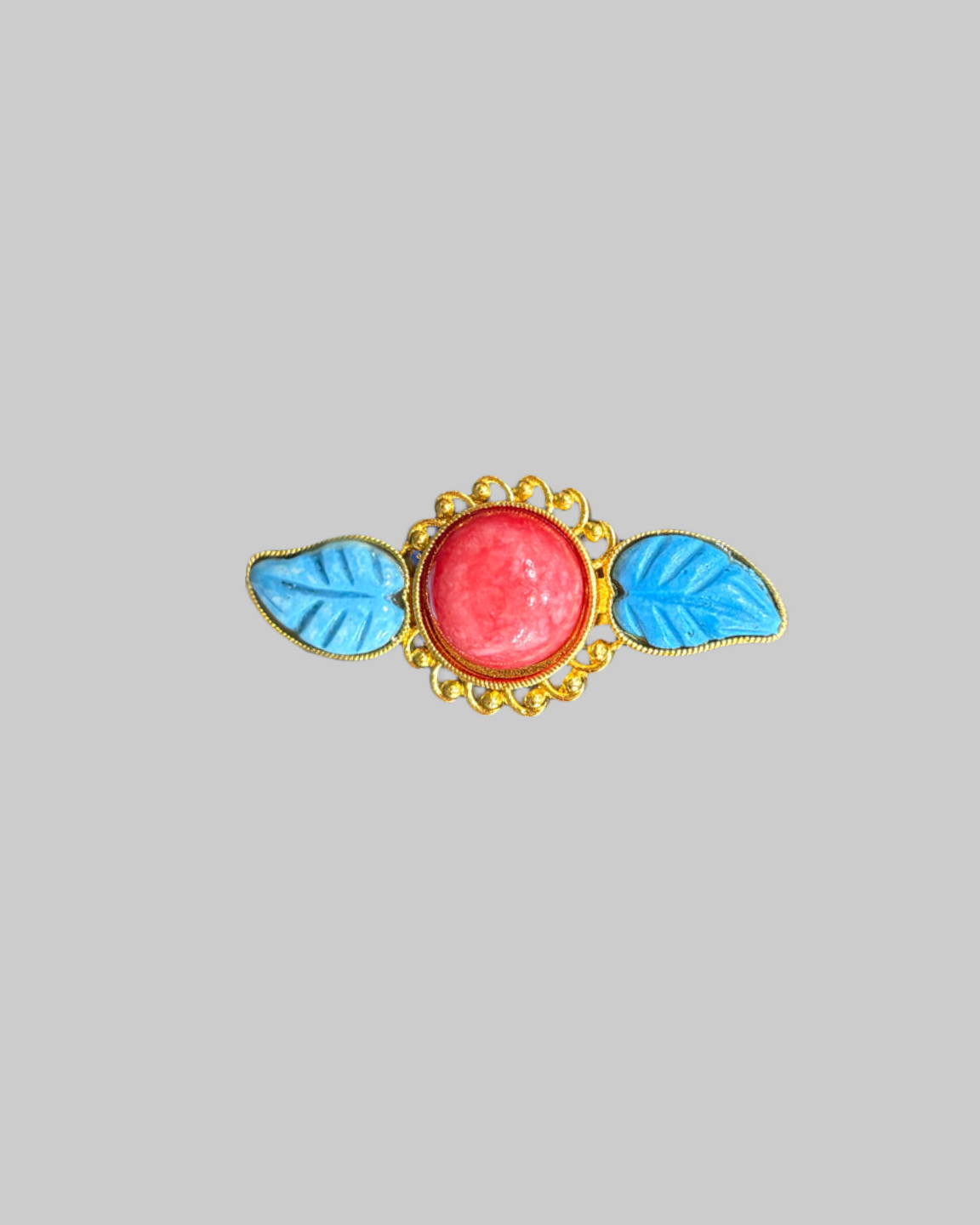 Vintage-Style Gold-Toned Brooch with Turquoise and Coral-Colored Stones front Vintage-Style Gold-Toned Brooch with Turquoise and Coral-Colored Stones - Image 1