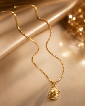Gold-Toned Necklace with Delicate Pendant and White Pearl Accent - Image 2
