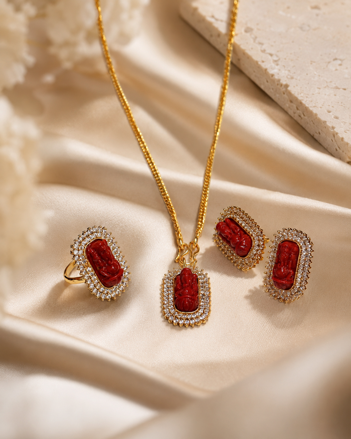Gold-Plated Ganesh Jewelry Set with Red Stone Pendant and White Crystal Accents Gold-Plated Ganesh Jewelry Set with Red Stone Pendant and White Crystal Accents - Image 1