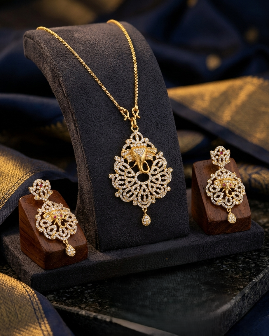 Gold-Plated Ganesh Pendant Set with Filigree Work and American Diamond Accents Gold-Plated Ganesh Pendant Set with Filigree Work and American Diamond Accents - Image 1