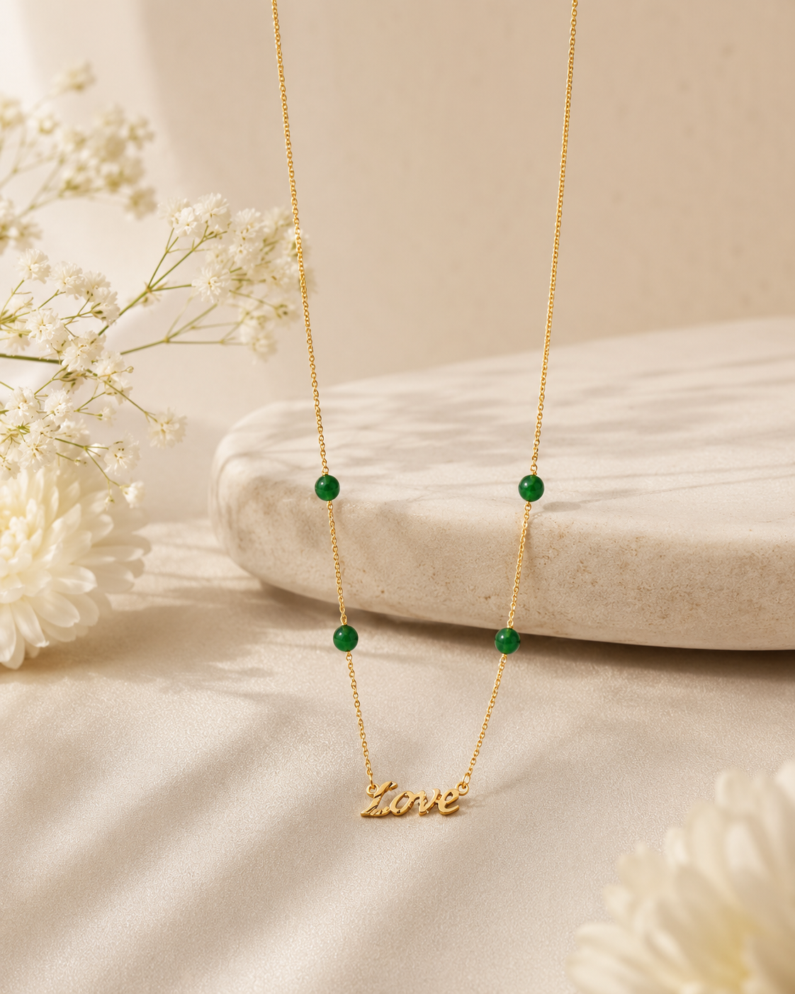 Gold-Toned Chain Necklace with Green Gemstone Beads and “Love” Script Pendant Gold-Toned Chain Necklace with Green Gemstone Beads and “Love” Script Pendant - Image 1
