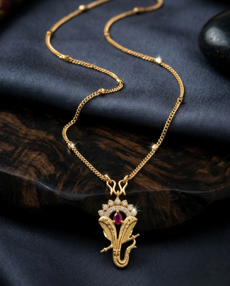 Gold-Toned Ganesha Pendant Necklace with CZ Stones & Ruby Accent Spiritual Jewelry Gold-Toned Ganesha Pendant Necklace with CZ Stones & Ruby Accent - Image 1