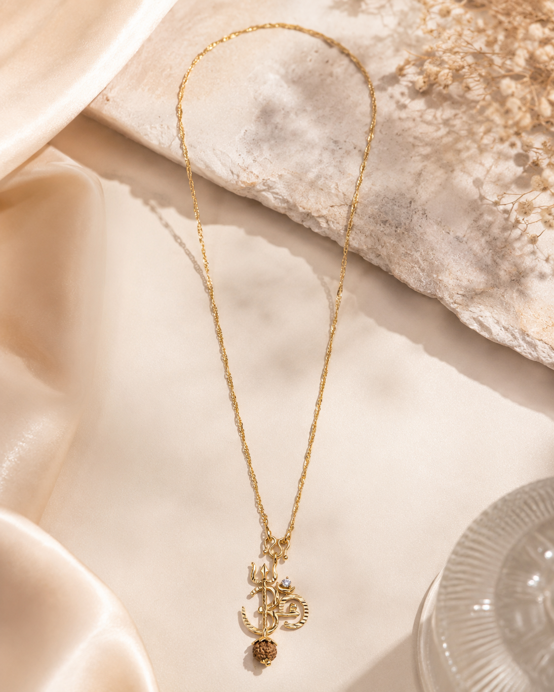 Gold-Toned Trident Pendant Necklace with Rudraksha Seed & Spiritual Symbol Devotional Jewelry Gold-Toned Trident Pendant Necklace with Rudraksha Seed & Spiritual Symbol - Image 1